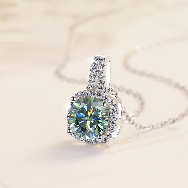 1 Carat Radiant Cut Green Moissanite Pendant In A Paved Halo Setting with Chain in Platinum Overlay Sterling Silver GRA Certified