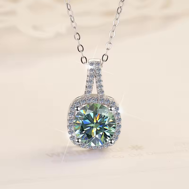 1 Carat Radiant Cut Green Moissanite Pendant In A Paved Halo Setting with Chain in Platinum Overlay Sterling Silver GRA Certified