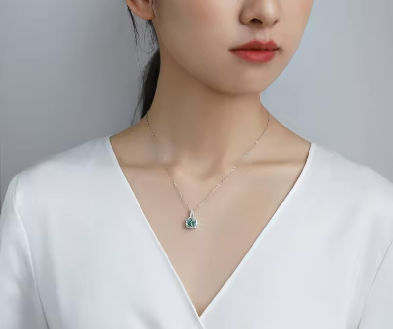 1 Carat Radiant Cut Green Moissanite Pendant In A Paved Halo Setting with Chain in Platinum Overlay Sterling Silver GRA Certified