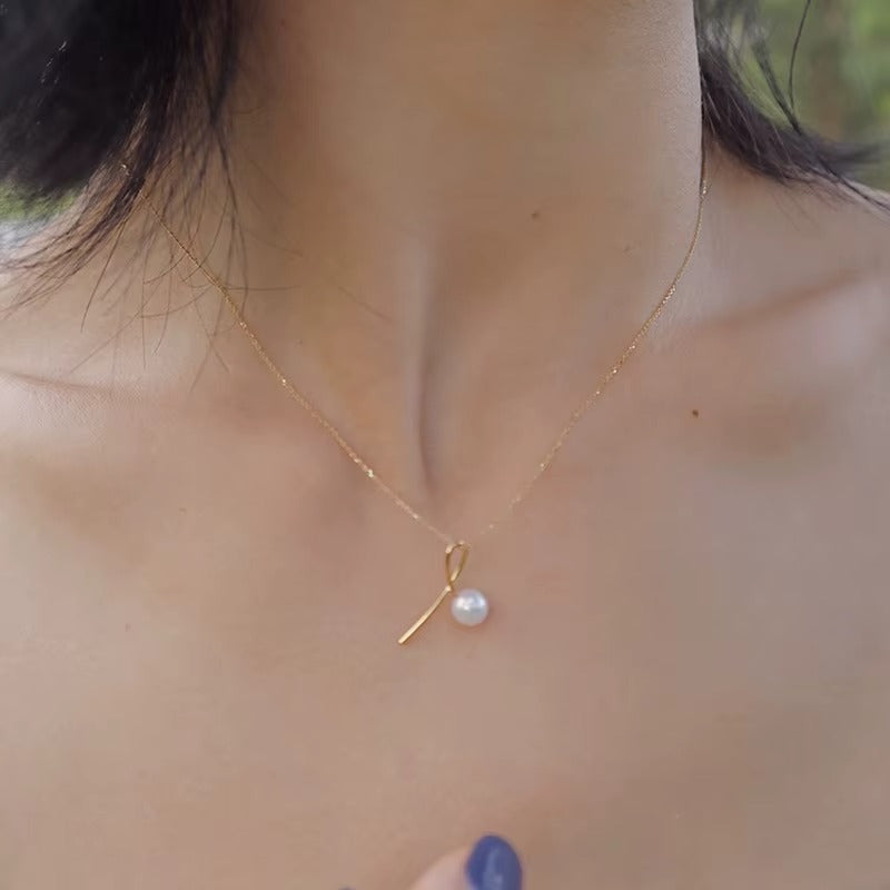 Caldwell	Pearl Bow Pendant Necklace