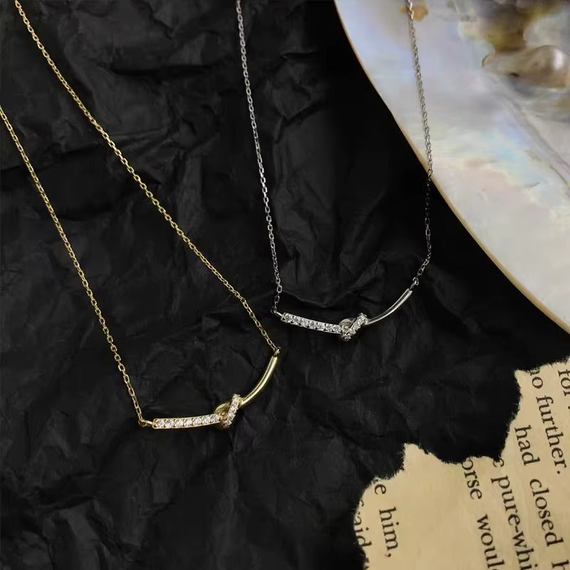 Carmel Crystal Knot Bow Pendant Necklace