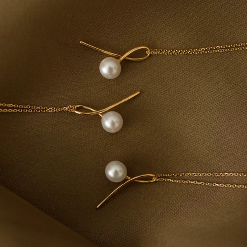 Caldwell	Pearl Bow Pendant Necklace