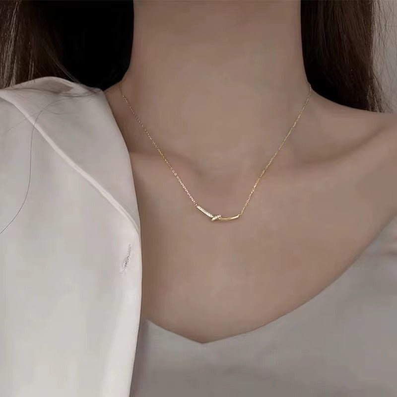 Carmel Crystal Knot Bow Pendant Necklace