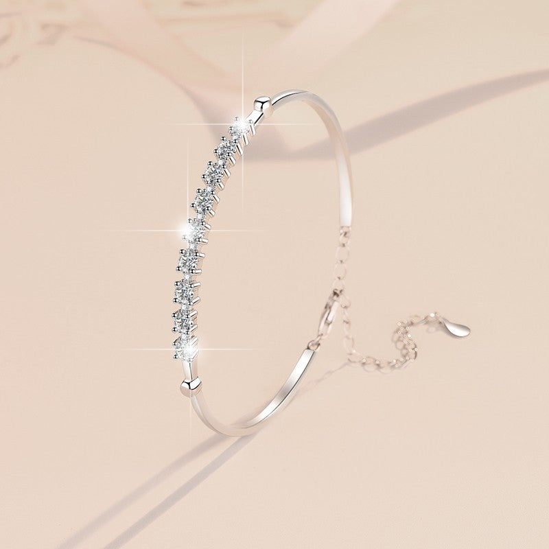 Discover the Brilliance of our 1 Carat Moissanite Bangle Bracelet in Platinum Overlay Silver