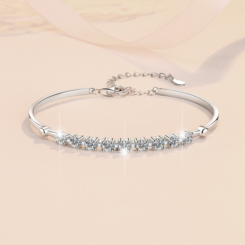 Discover the Brilliance of our 1 Carat Moissanite Bangle Bracelet in Platinum Overlay Silver