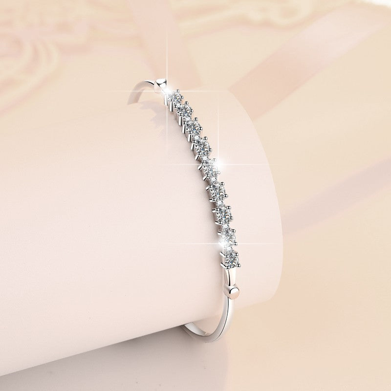 Discover the Brilliance of our 1 Carat Moissanite Bangle Bracelet in Platinum Overlay Silver