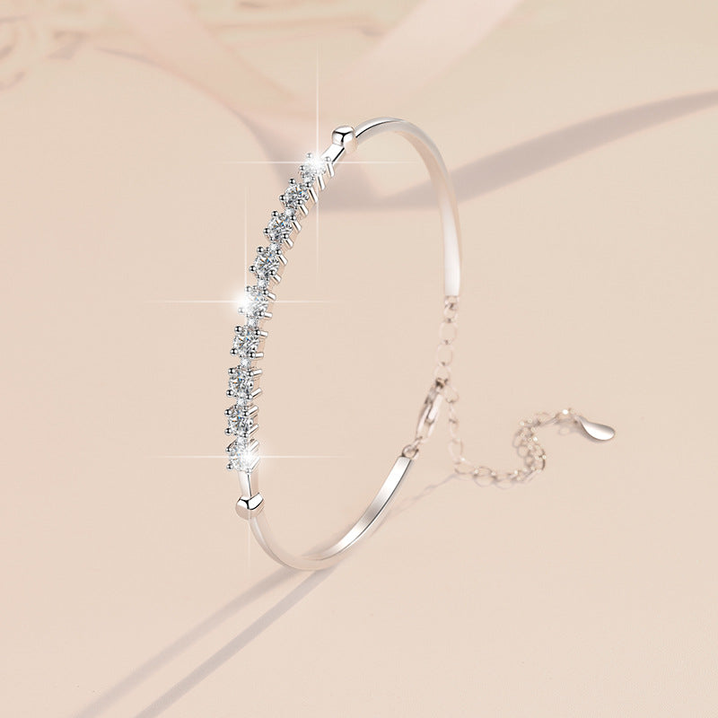 Discover the Brilliance of our 1 Carat Moissanite Bangle Bracelet in Platinum Overlay Silver