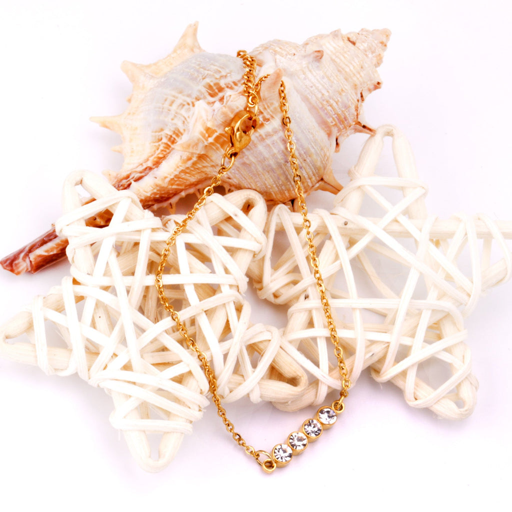 Hermes 4 Stone Gold Bracelet