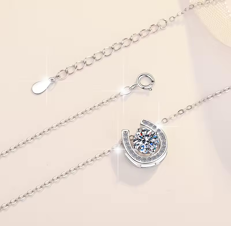 Luck and Luxury: 1 Carat Solitaire Drop Moissanite Horseshoe Pendant with Chain in Platinum Overlay Sterling Silver, GRA Certified